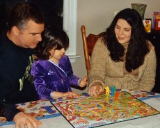 Adoptive Family Photo: Playing Board Games with Niece, click to view bigger version