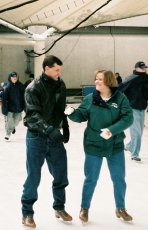 Adoptive Family Photo: Jen Teaching Scott<br>to Ice Skate at Crown <br>Center in Kansas City, click to view bigger version