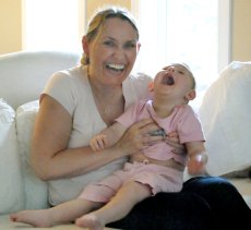 Adoptive Family Photo: Sophia and Mom Having a<br>Hysterical Fit of Laughter!, click to view bigger version