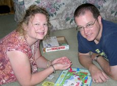 Adoptive Family Photo: A Game of Monopoly, click to view bigger version