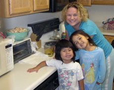 Adoptive Family Photo: Cooking Thanksgiving Dinner, click to view bigger version