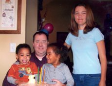 Adoptive Family Photo: Celebrating Miguel�s Birthday, click to view bigger version