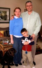 Adoptive Family Photo: Christian and His Stuffed Dog, <br>Spotty with Our Dog, China, click to view bigger version