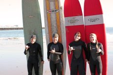 Adoptive Family Photo: Kelley Surfing With Her Sisters the Day After Christmas in Santa Cruz, click to view bigger version