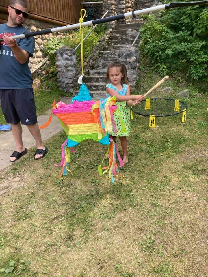 Jarred Helping With the Birthday Pinata