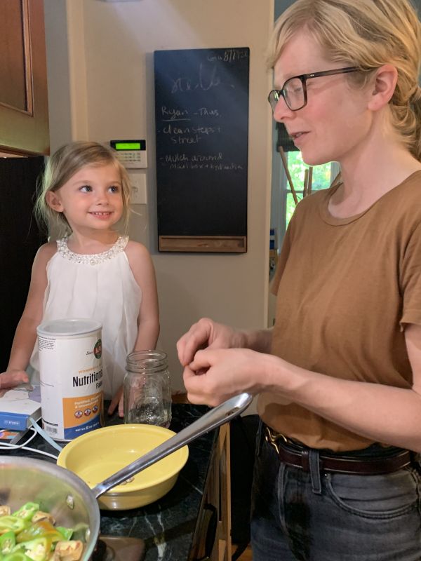 Sam Cooking With a Friend's Daughter