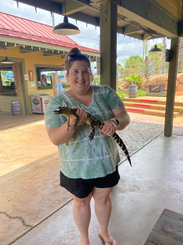Pam Holding a Baby Alligator