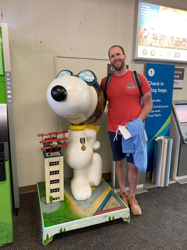 Matt with Snoopy at the Airport