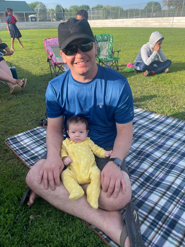 Anthony with Our Niece at a Soccer Game