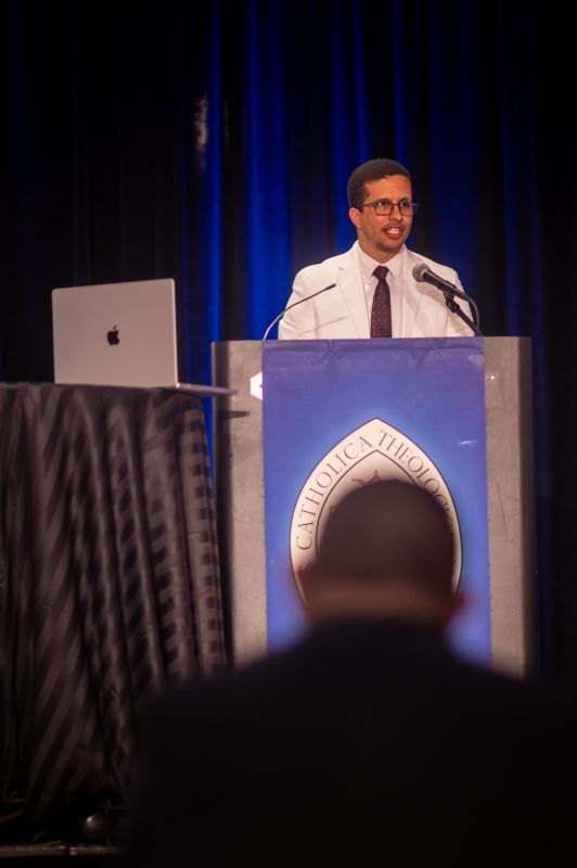 Andrew Delivering a Keynote Address