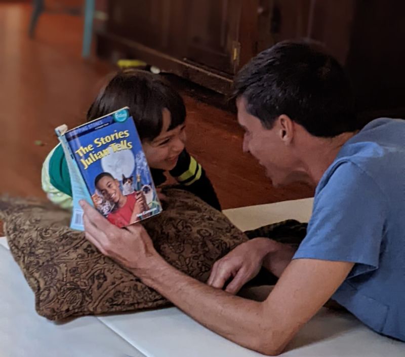Matt Reading With Our Friend's Kid