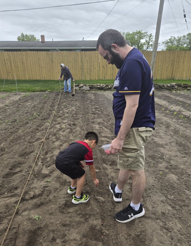Helping Grandpa in the Garden