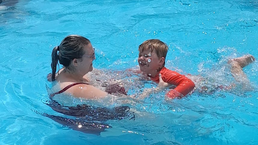 Rachael Teaching Our Nephew How to Swim