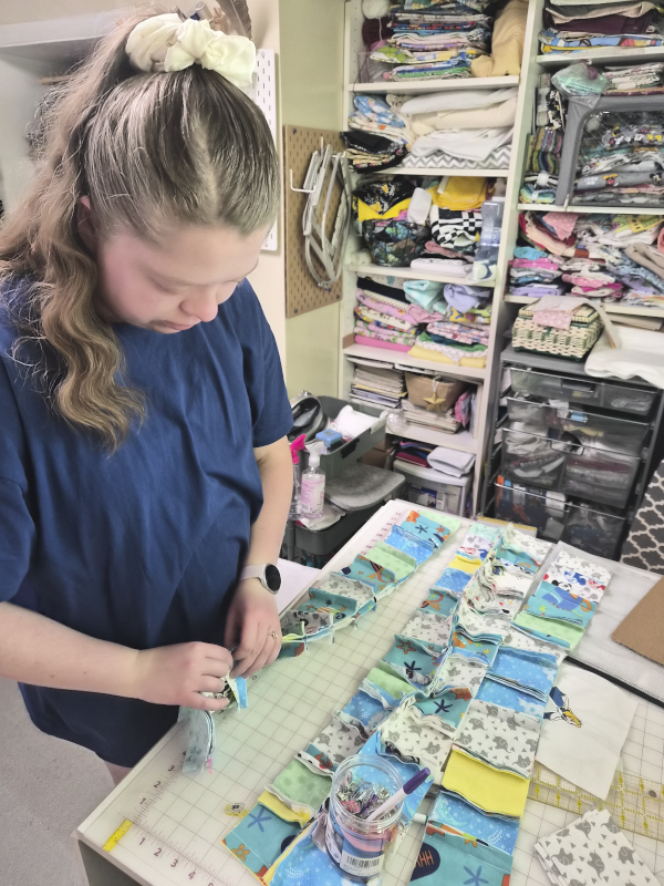 Bethany Pinning a Quilt