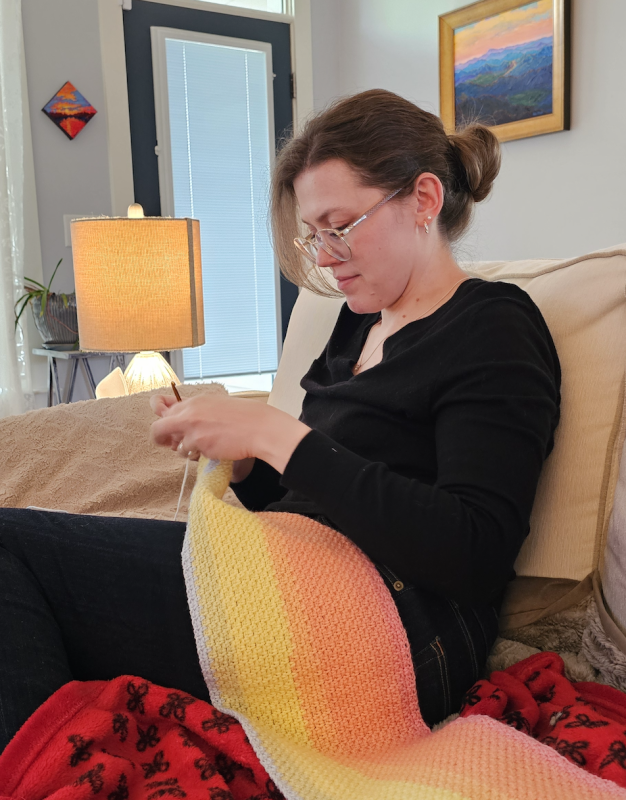 Leah Working on a Crochet Project