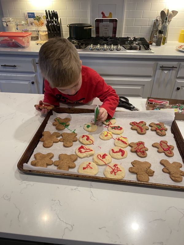 Isaac Decorating Cookies for Christmas