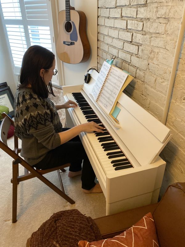 Lindsey Playing Her Piano