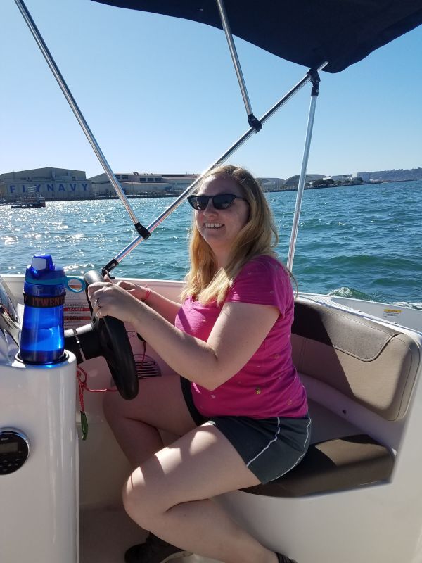 Julie Driving the Boat in San Diego Harbor