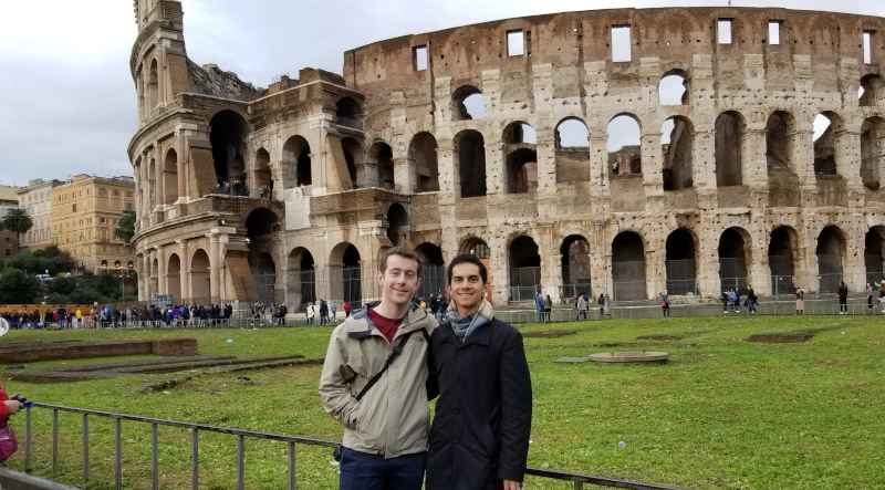 Standing in front of the Colosseum